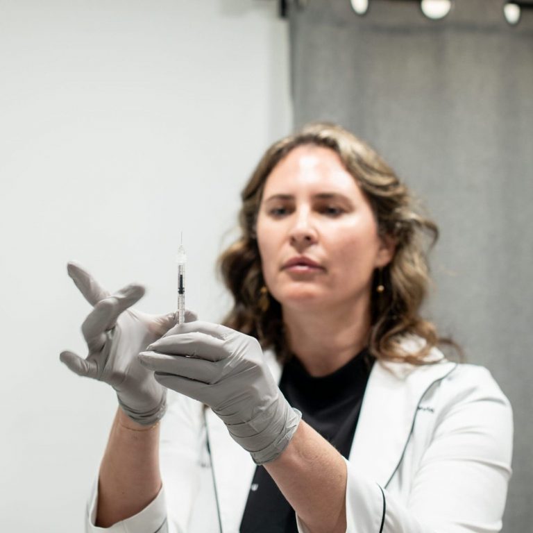 Doctor Stankovic holding a botox needle